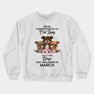 Never Underestimate An Old Woman Who Loves Dogs And Was Born In March Crewneck Sweatshirt